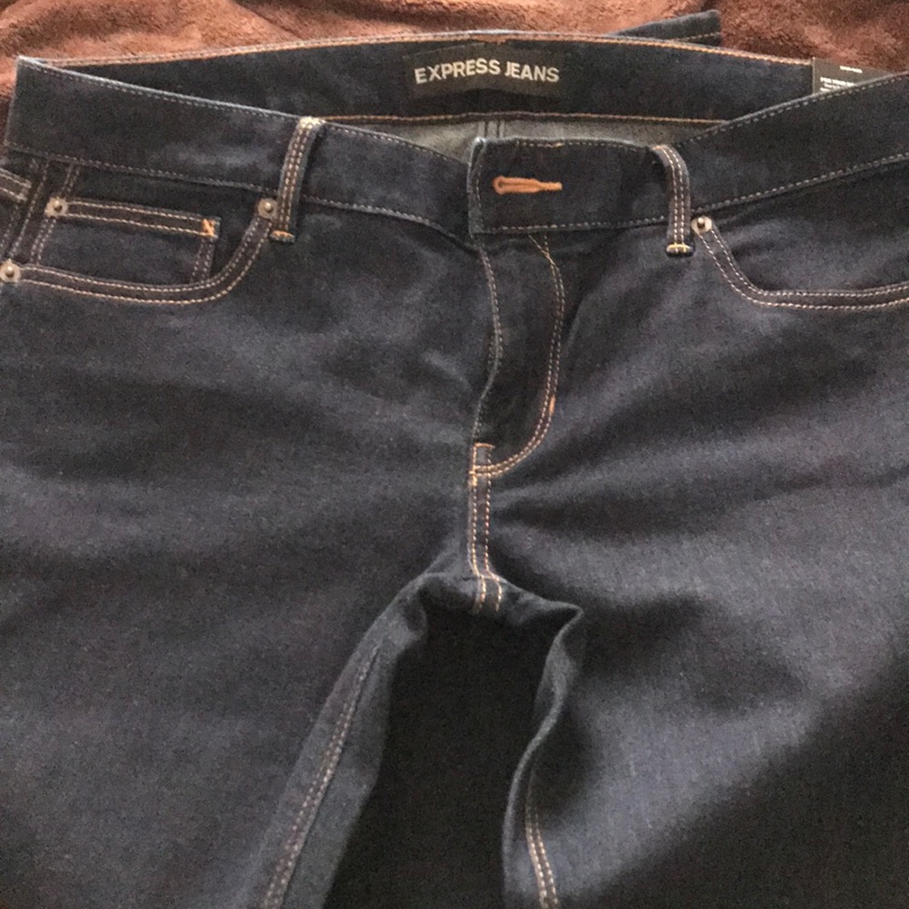 Brand new dark express jeans.